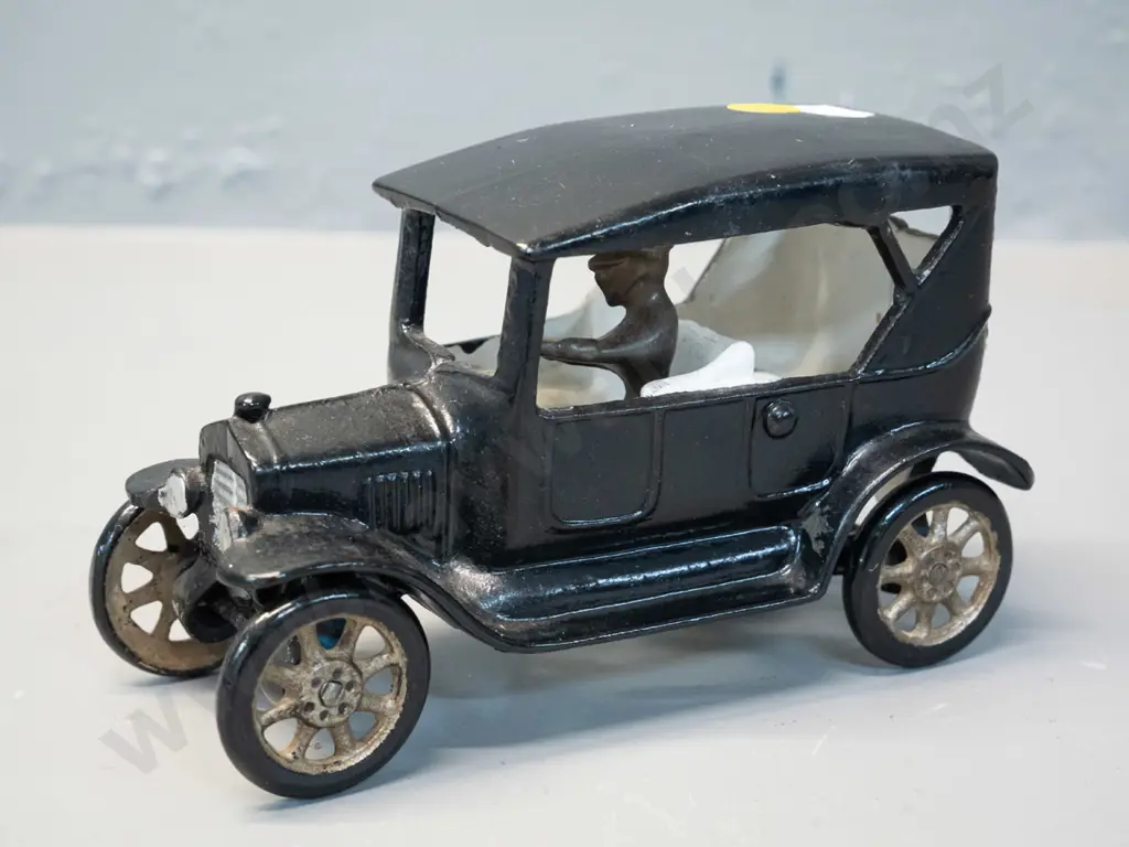 cast metal vintage car painted black white and silver, with separate unpainted peg-fit driver - H-100 L-160 Image 1++