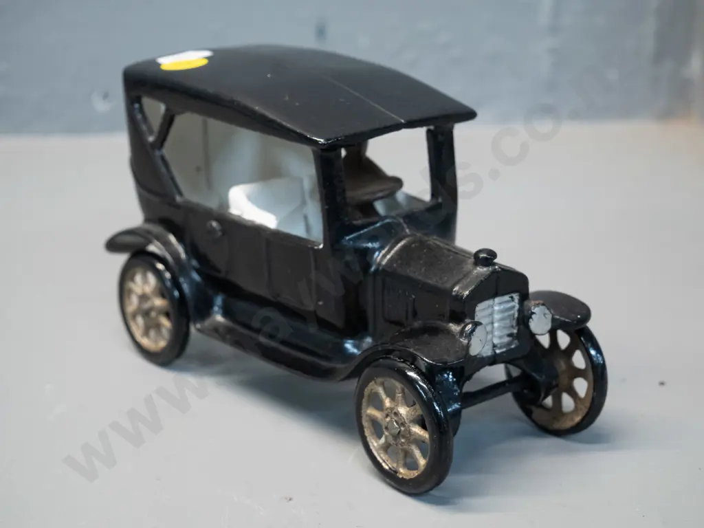 cast metal vintage car painted black white and silver, with separate unpainted peg-fit driver - H-100 L-160 Image 1++