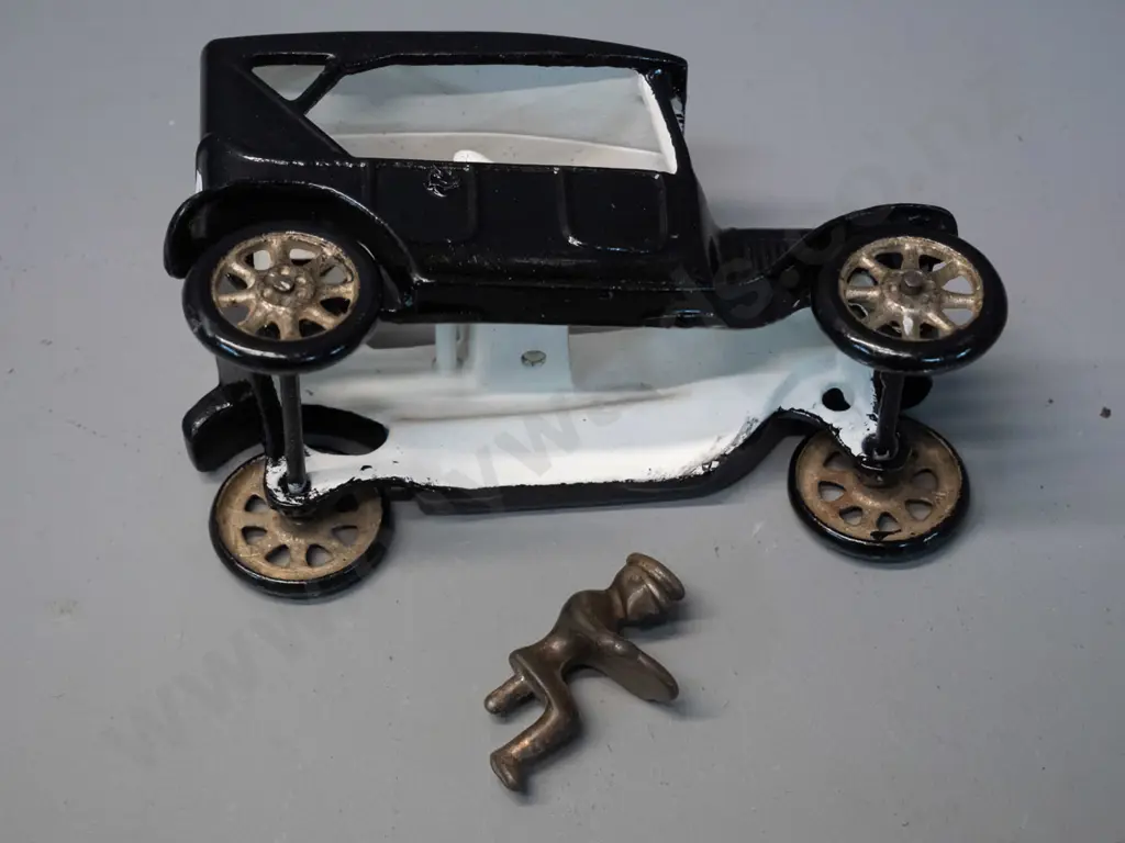cast metal vintage car painted black white and silver, with separate unpainted peg-fit driver - H-100 L-160 Image 1++