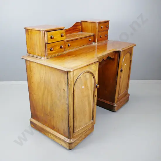 Victorian mahogany 3-drawer dressing table, above 2 arched panelled cupboard pedestals with drawer and shelf