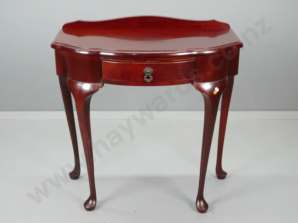 reproduction mahogany side table with serpentine front, single drawer, turned legs w/ pad feet - some crazing to polish Image 1++