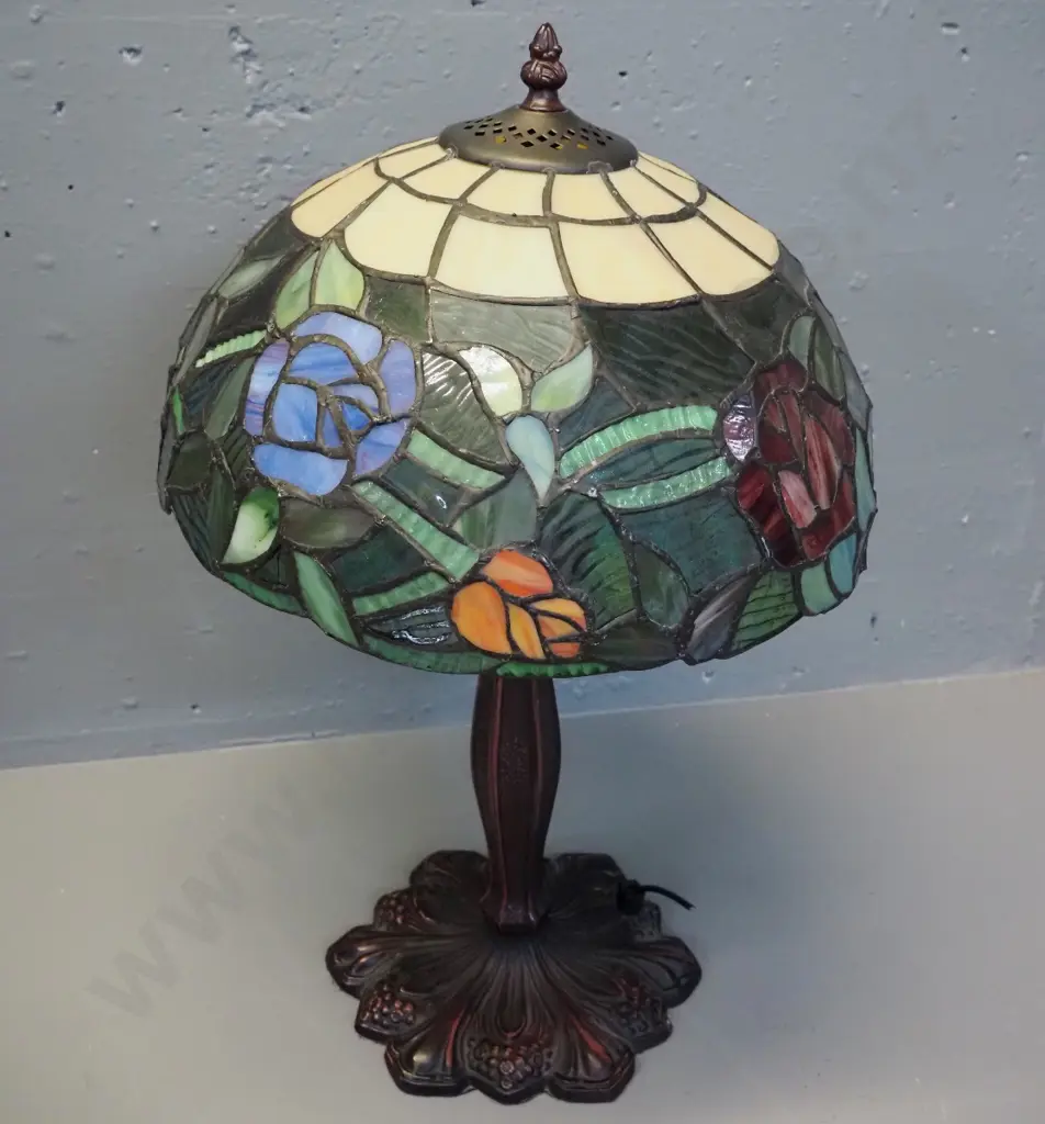 reproduction Tiffany style leadlight table lamp - floral motif shade, cast metal base. Cord has been cut, needs rewiring Image 1++