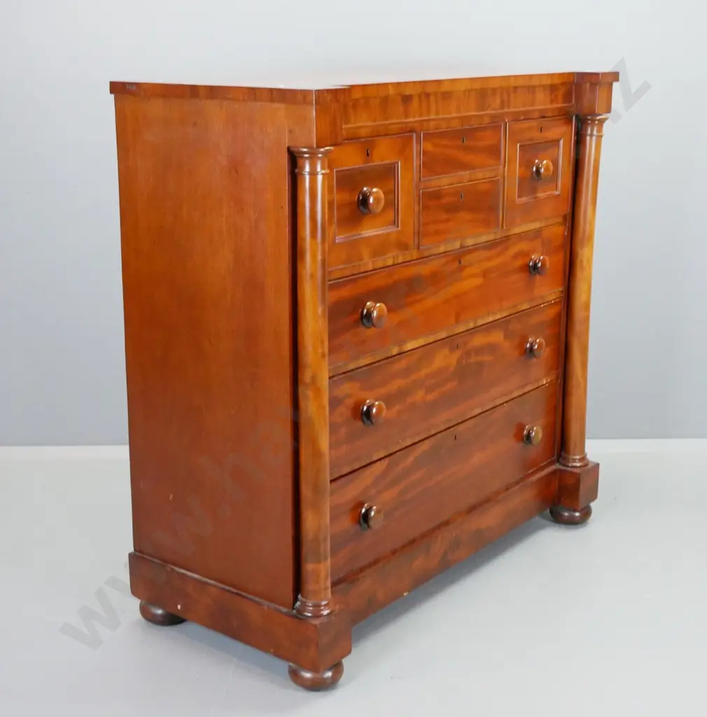 Victorian mahogany 7 drawer chest, all lockable, 2 have no knobs, has key. Turned pilasters, bun feet. Scratches to top. Image 1++