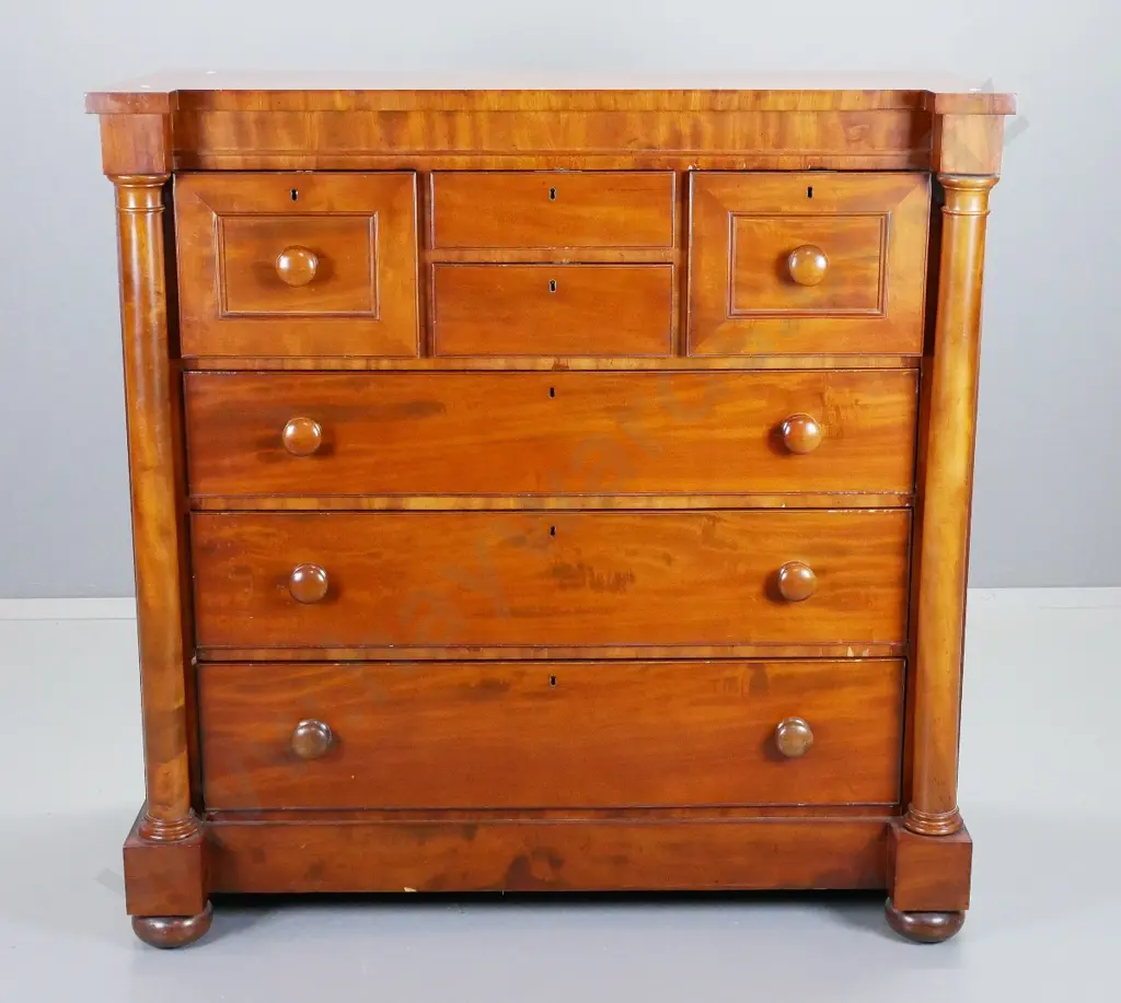 Victorian mahogany 7 drawer chest, all lockable, 2 have no knobs, has key. Turned pilasters, bun feet. Scratches to top. Image 1++