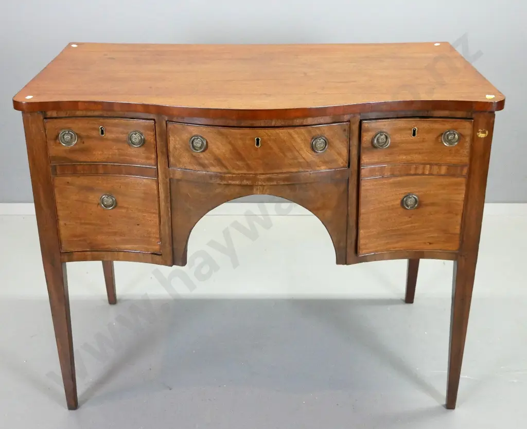 Regency mahogany serpentine fronted sideboard w/3 drawers with ring handles, square tapered legs - remnants of BADA seal Image 1++