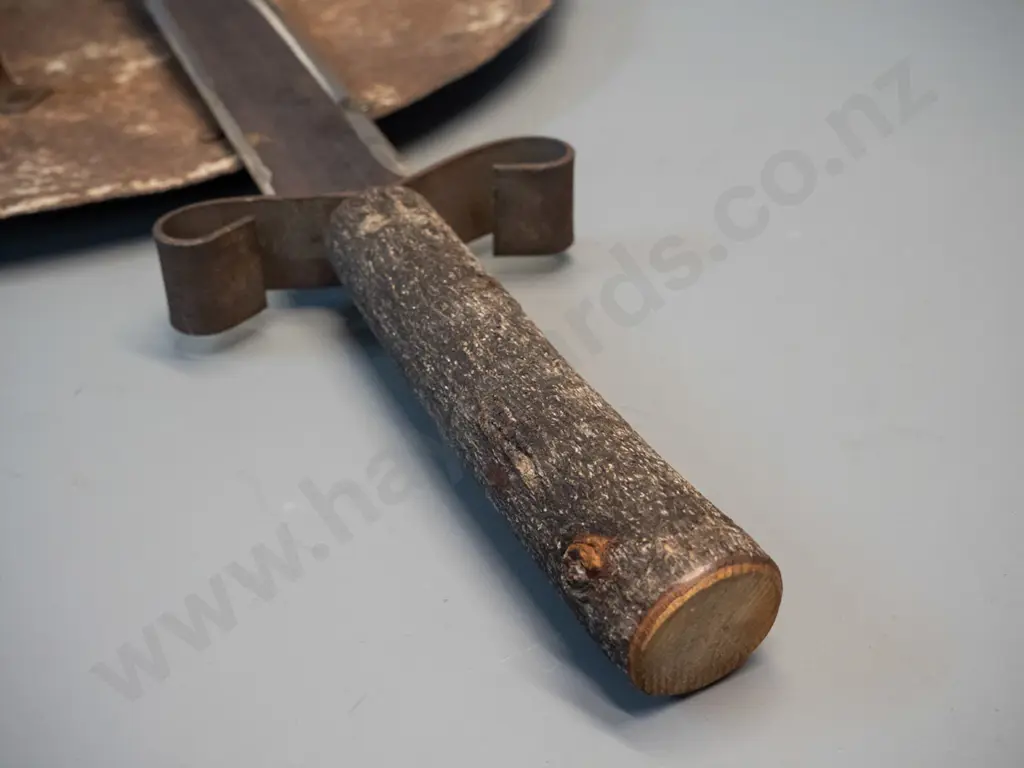 decorative shield and crossed swords - iron with beaten brass star, timber tree branch handles H-800 W-760 Image 1++