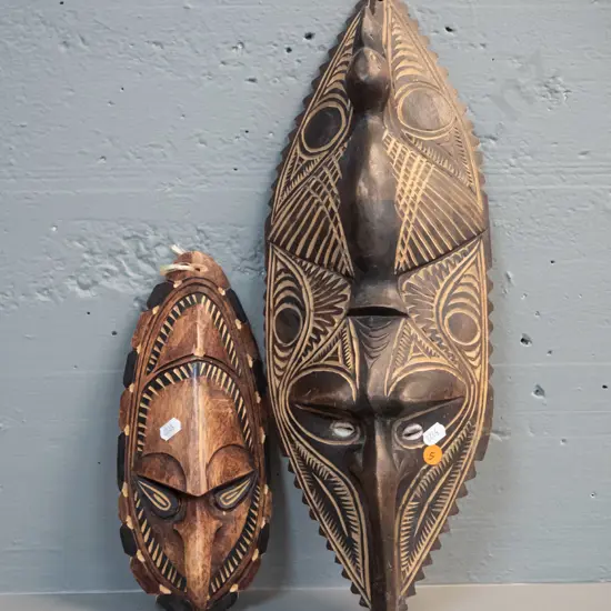 2 carved timber decorative wall masks - one bird motif with shell inset eyes H-480 W-170