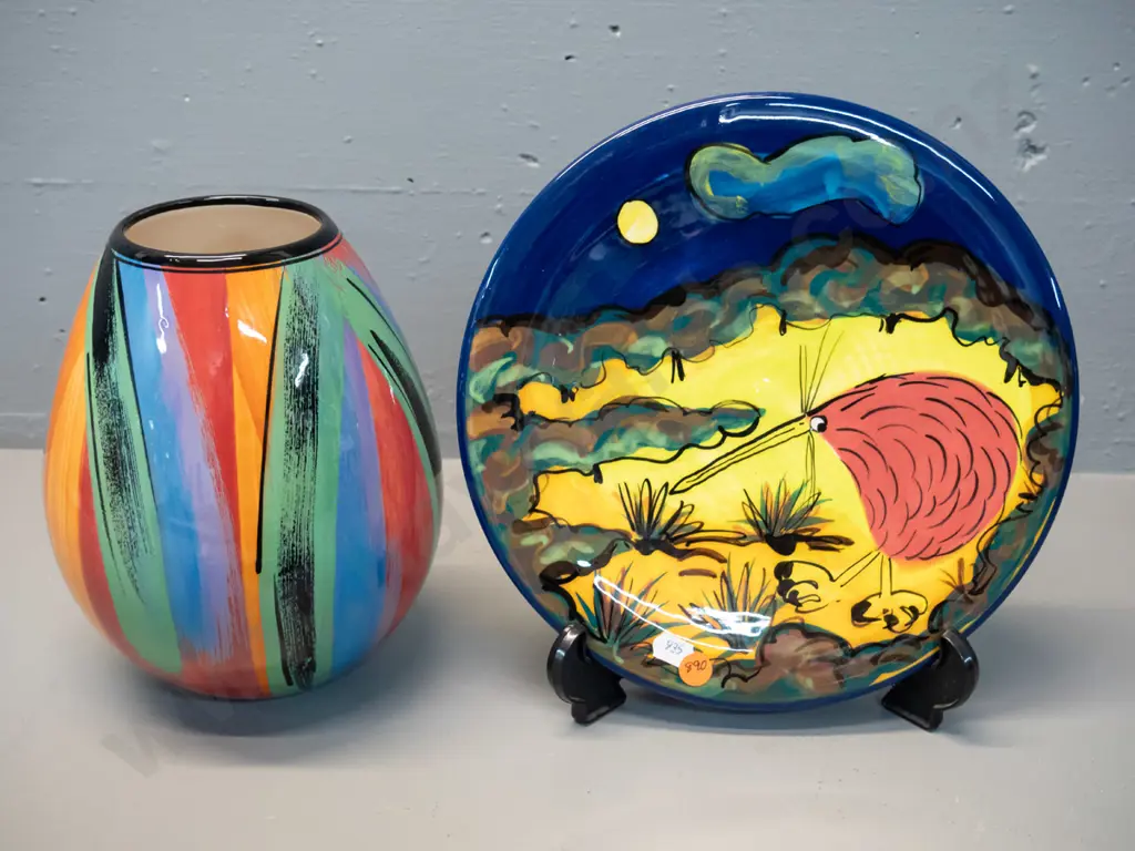 2 studio pottery items - Catherine Anselmi vase H-220 and a kiwi themed plated marked "PH" D-250 Image 1++