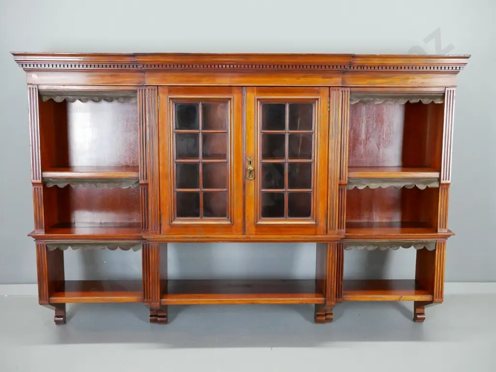 late 19th century mahogany break front hanging bookcase w/dentil moulding decoration to cornice, 2 astragal glazed doors Image 1++