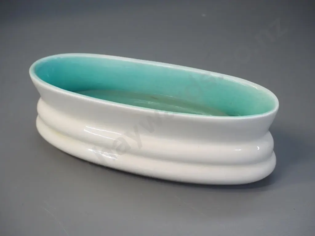 O.C. Stephens trough vase with cream exterior, teal inner H-80 L-220 Image 1++