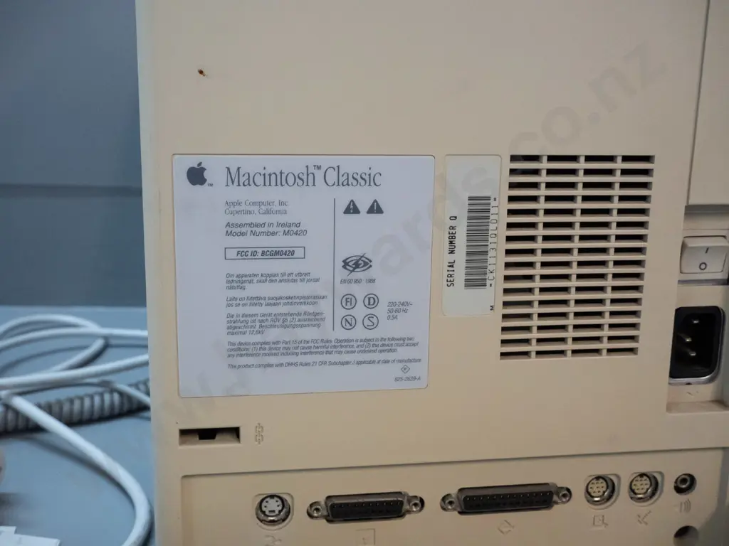 circa 1990 Apple Macintosh Classic model M0420 computer with keyboard, mouse, assorted software, diskettes, etc. Image 1++