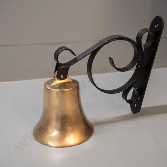 heavy brass bell, no clapper, on painted metal wall mount - bell is H-120 D-120