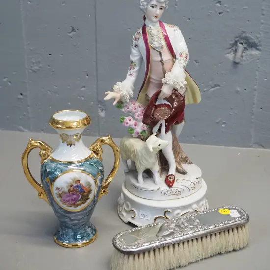 Sterling silver-backed clothes brush, Limoges vase, and a continental musical figurine H-310