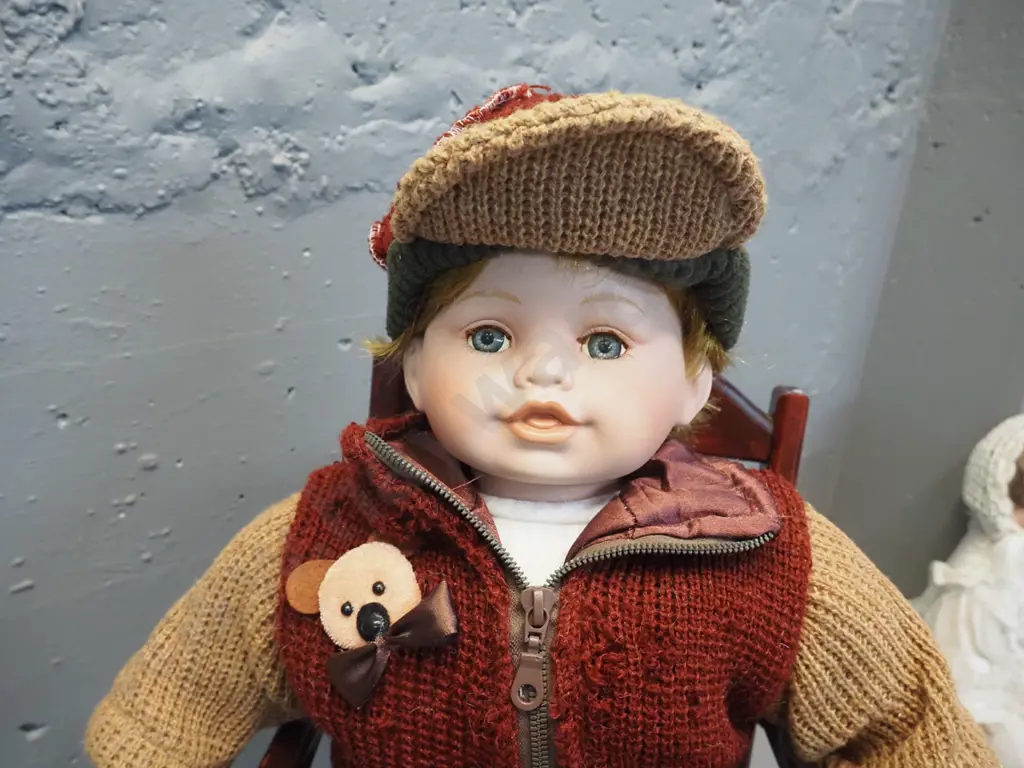 young boy doll on timber rocking chair with toy aeroplane - sitting as photographed H-620, chair D-400 Image 1++