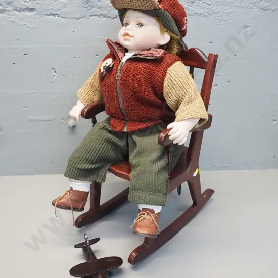 young boy doll on timber rocking chair with toy aeroplane - sitting as photographed H-620, chair D-400