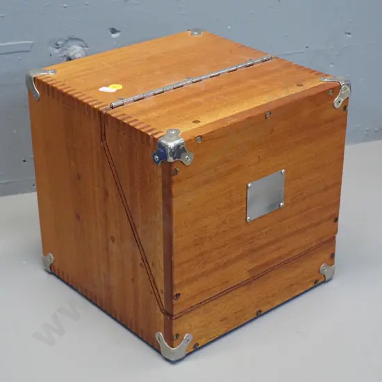 timber box with hinged front flap, rear panel with spring-tab closure, metal corner binding and blank plaque 250x250x250