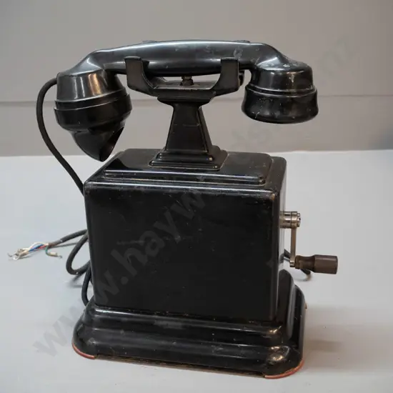 vintage table-top telephone with metal body, bakelite handset, hand crank on side H-280 W-240 D-140 - overall wear and