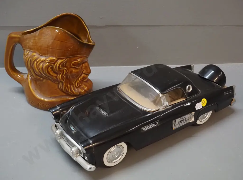 Jim Beam Ford Thunderbird decanter, sealed, with contents and a McCallum whisky water jug Image 1++