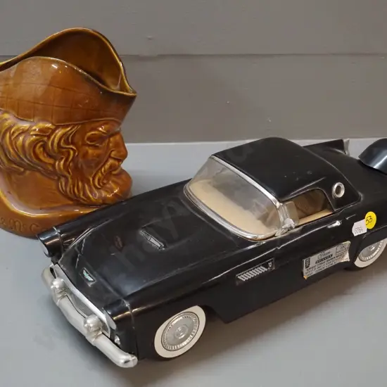 Jim Beam Ford Thunderbird decanter, sealed, with contents and a McCallum whisky water jug