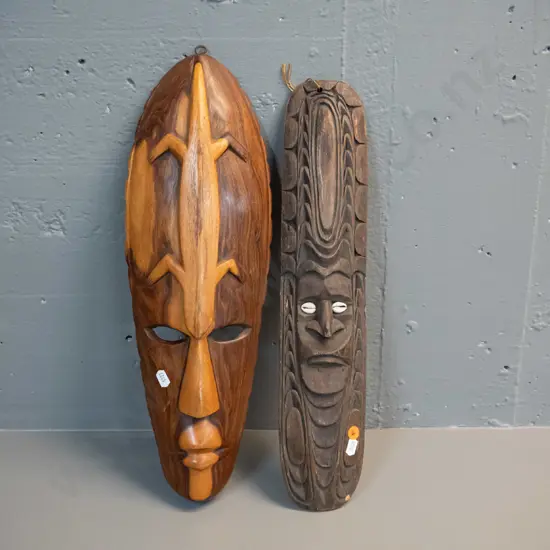 2 carved timber decorative wall masks - one with shell inset eyes, one with relief lizard H-450 W-170