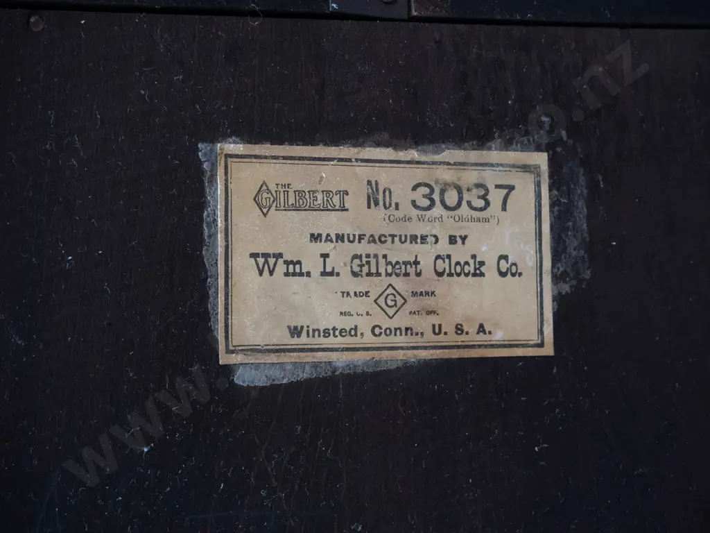 vintage timber cased chiming wall clock - W.L. GIlbert USA label on back - polish needs attention, screw hole to backing Image 1++