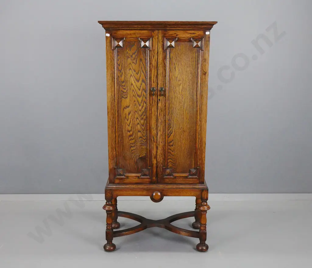 vintage oak cabinet with 2 panelled doors w/ drop handles, 14 interior drawers. some with partitions, panelled sides, on Image 1++