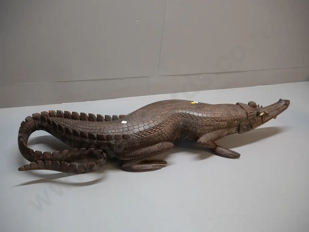 large carved timber crocodile with cowrie shell eye inserts - some chips and wear L-1070 W-250 at widest Image 1++