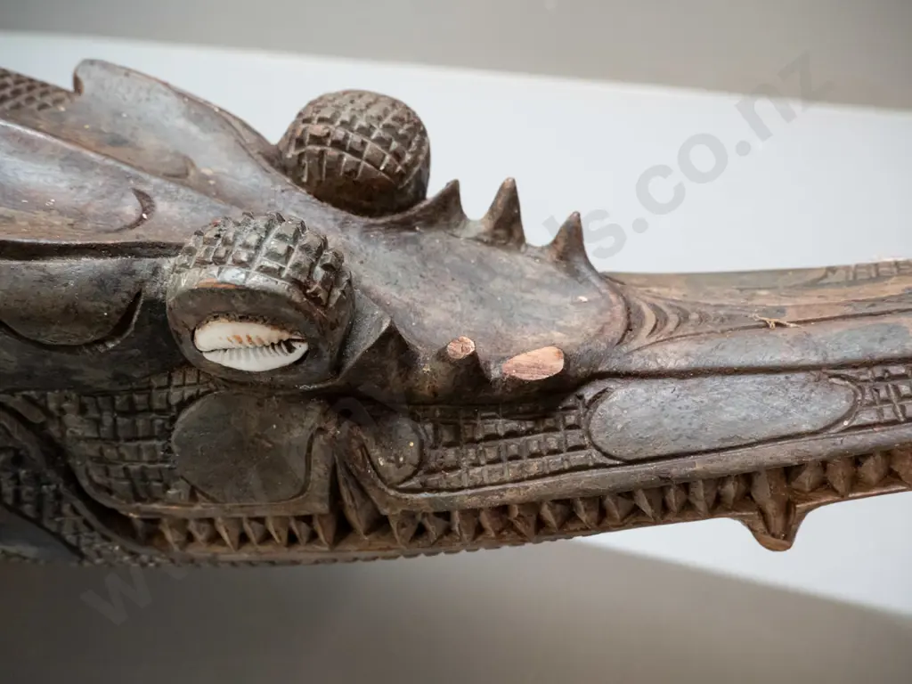 large carved timber crocodile with cowrie shell eye inserts - some chips and wear L-1070 W-250 at widest Image 1++
