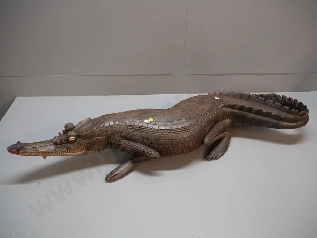 large carved timber crocodile with cowrie shell eye inserts - some chips and wear L-1070 W-250 at widest Image 1++