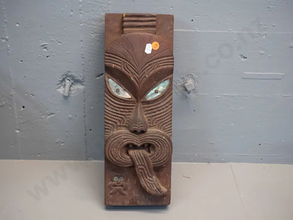carved and stained timber Maori motif wall ornament with paua inset eyes - some chips and wear to paint H-360 W-120 Image 1++