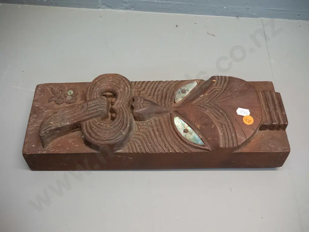 carved and stained timber Maori motif wall ornament with paua inset eyes - some chips and wear to paint H-360 W-120 Image 1++