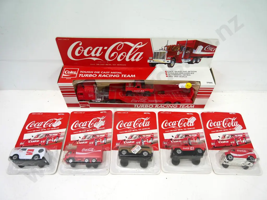 Coca-Cola branded die-cast model vehicles - large race team transporter and 5 small carded Image 1++