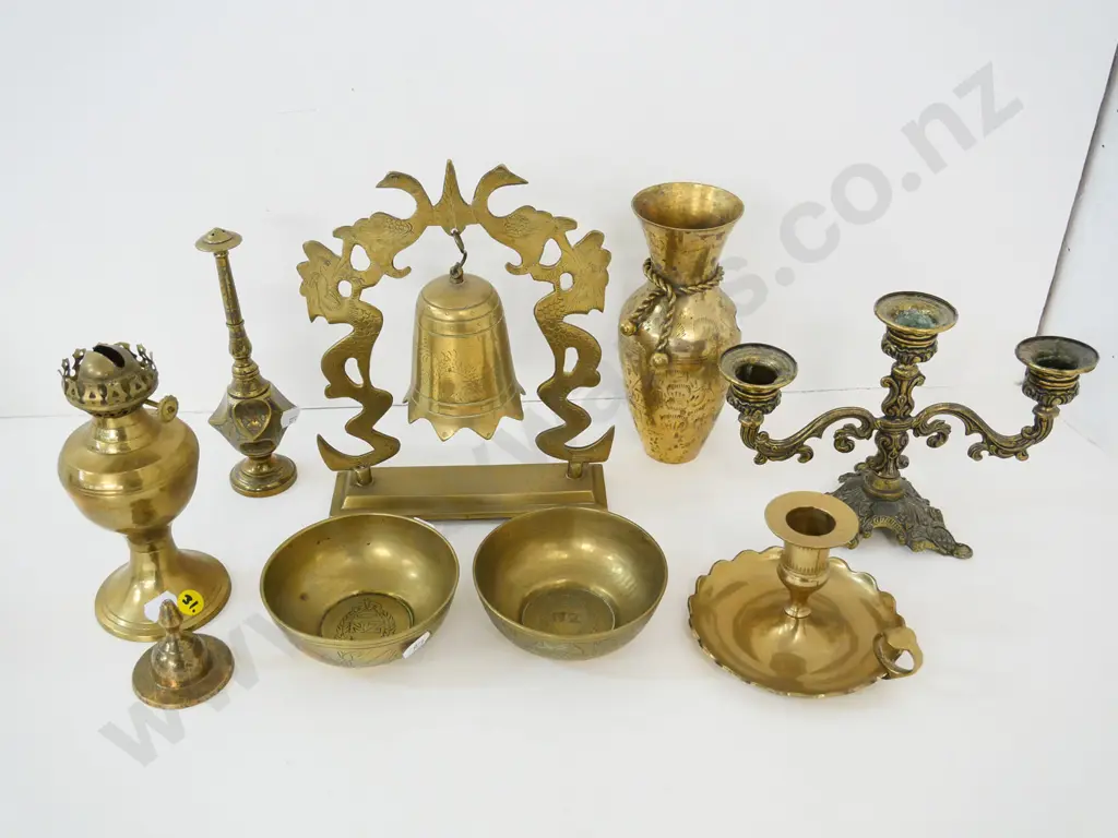 assorted brass items including Chinese bell & frame, 2 Egyptian theme dishes with NZF etching added, etc. Image 1++