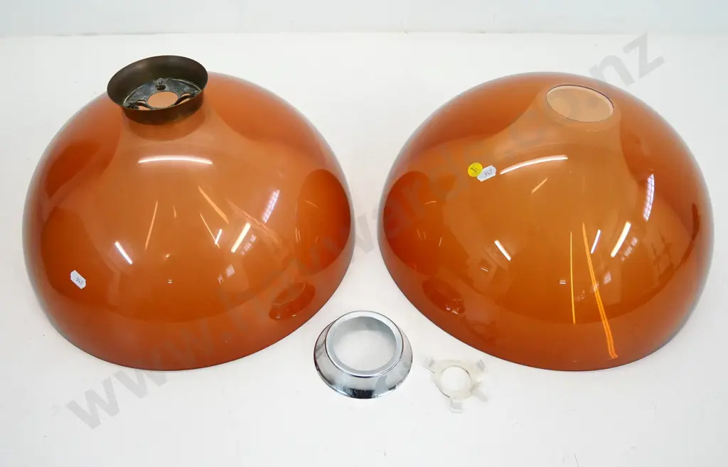 pair of transparent copper colour perspex hanging light shade, 1 chrome & 1 brass journal, one clip broken D360 Image 1++