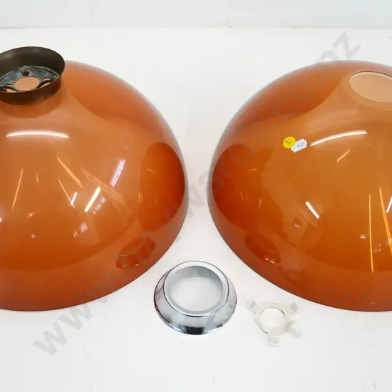 pair of transparent copper colour perspex hanging light shade, 1 chrome & 1 brass journal, one clip broken D360