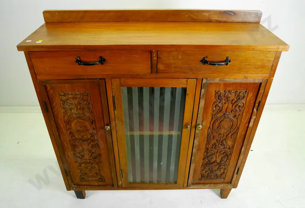 mixed timber sideboard w/2 carved wood & one glazed doors, 2 drawers, mixed handles, polish needs work H-950 W-940 D-310 Image 1++
