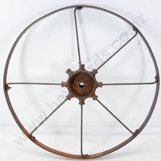 vintage large cast iron agricultural wheel, missing one spoke, one broken. Diameter 1200