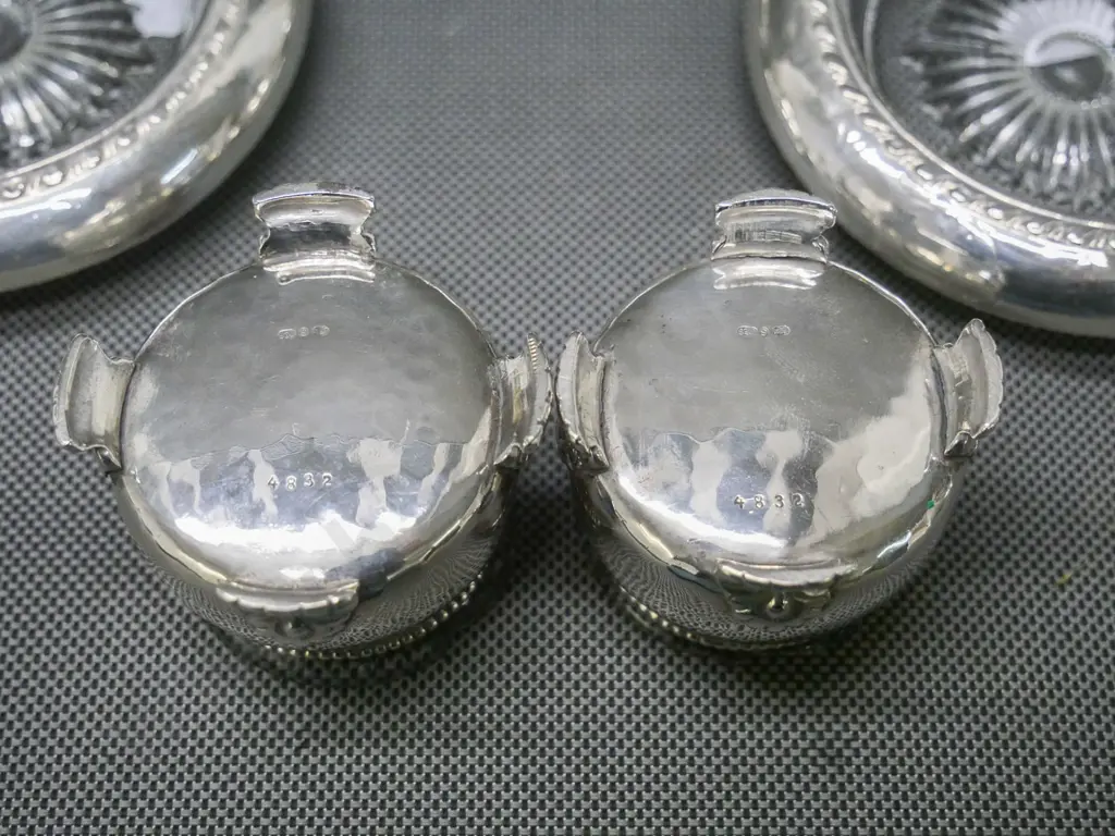 pair of sterling Norway 830S silver salts with chipped glass liners (82g),set of 6 glass unmarked silver-rimmed coasters Image 1++