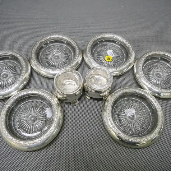 pair of sterling Norway 830S silver salts with chipped glass liners (82g),set of 6 glass unmarked silver-rimmed coasters