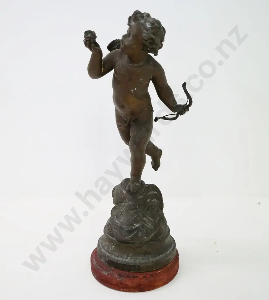 metal cupid figure on wooden base - damage to back, missing wing. H-340 Image 1++