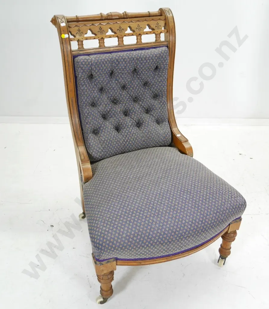 vintage oak ornately carved deep-button lounge chair on porcelain casters H980 W600 D600 Image 1++