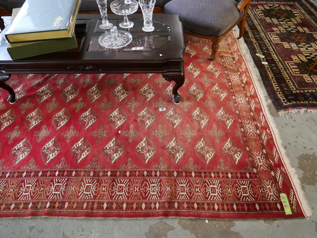 large hand-knotted Persian style floor rug - mainly red tones L3000 W2000 Image 1++