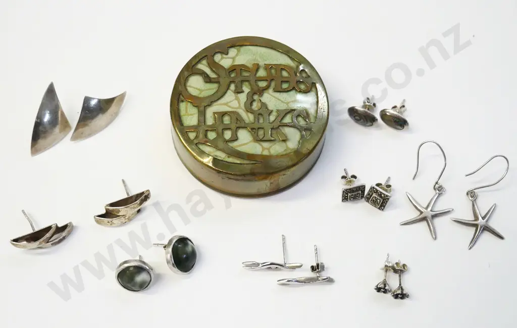 8 pairs of asstd silver earrings all stamped in a small container with studs & links on lid Image 1++