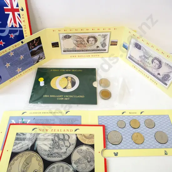 3 New Zealand carded coin sets - 1990 uncirculated, 1990 Kiwi Dollar coin/banknotes, 1994 Endeavour & 2 loose 50 cent