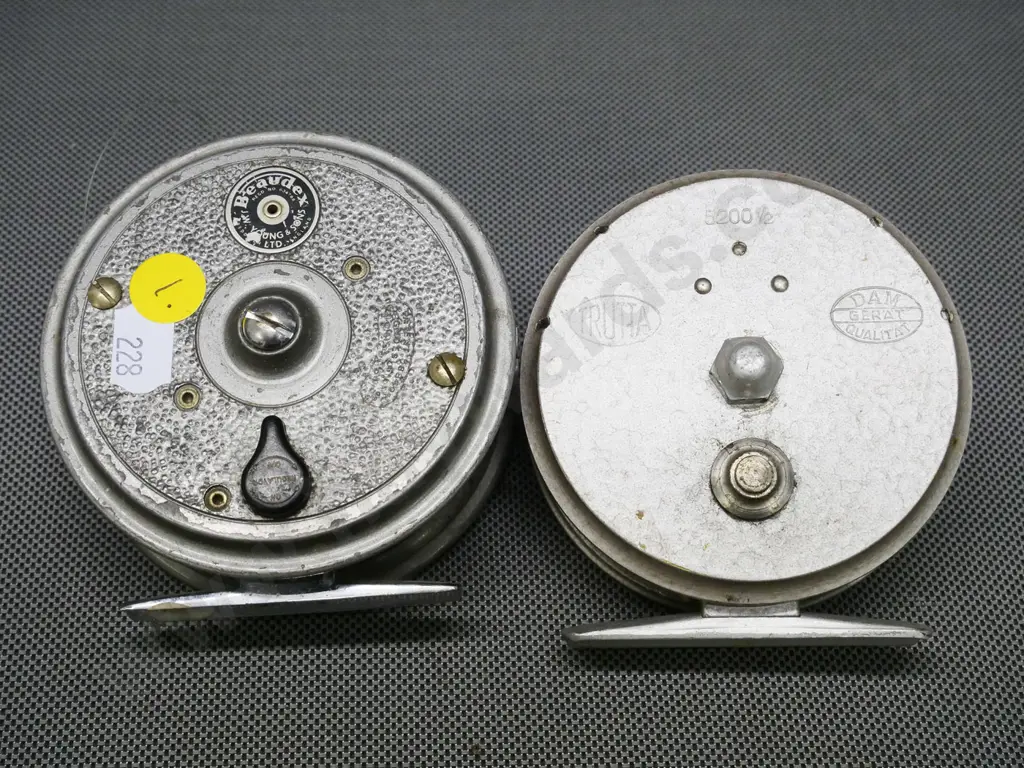 2 aluminium fly fishing reels - LW Young 'Beaudex' and a DAM 'Trutta' Diameter approx. 90mm Image 1++