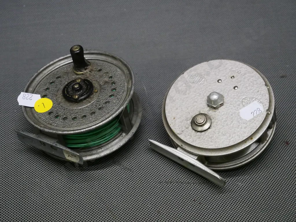 2 aluminium fly fishing reels - LW Young 'Beaudex' and a DAM 'Trutta' Diameter approx. 90mm Image 1++