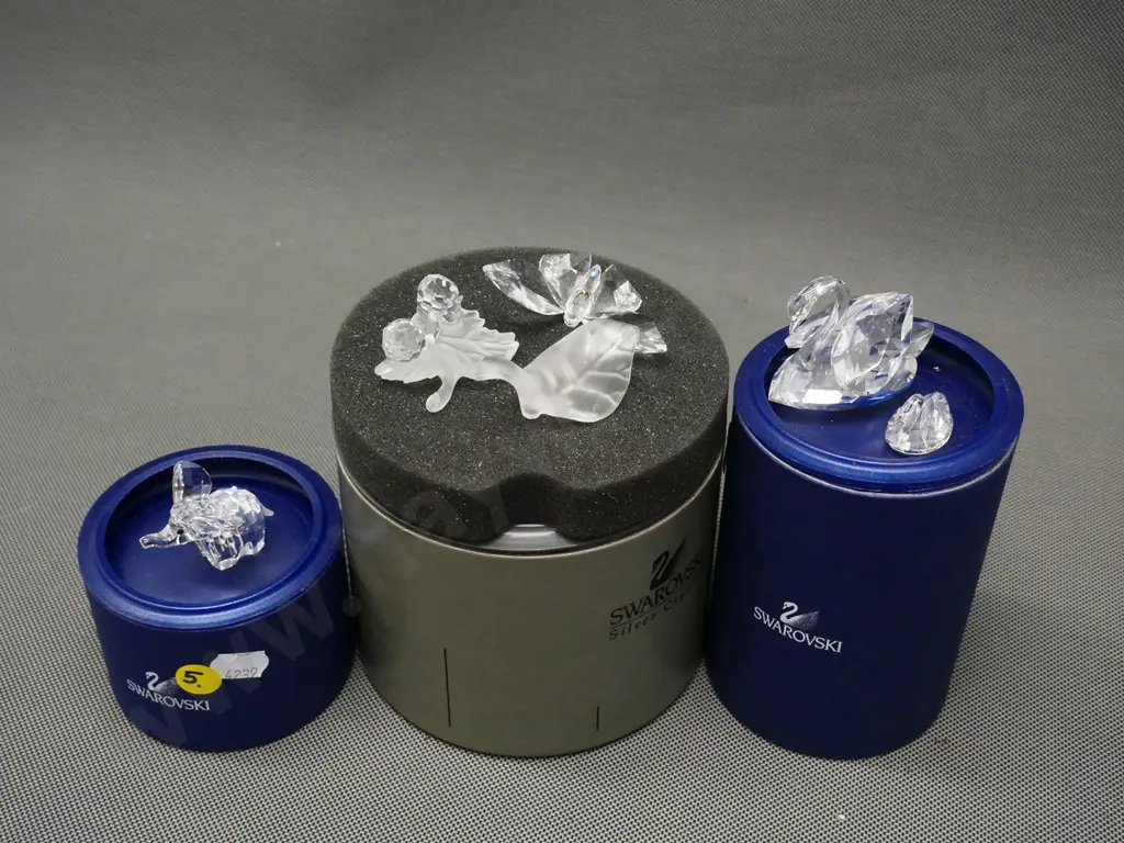 4 Swarovski crystal miniatures/sets with part cases - 2 swans, elephant, 2 snails, & butterfly separated from its leaf Image 1++