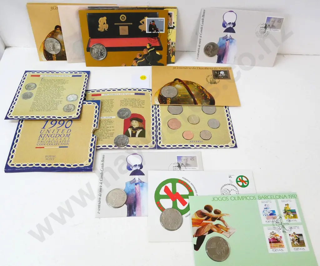 assorted Portugese and Spanish carded collector's coin issues and 1990 UK Royal Mint uncirculated coin set Image 1++
