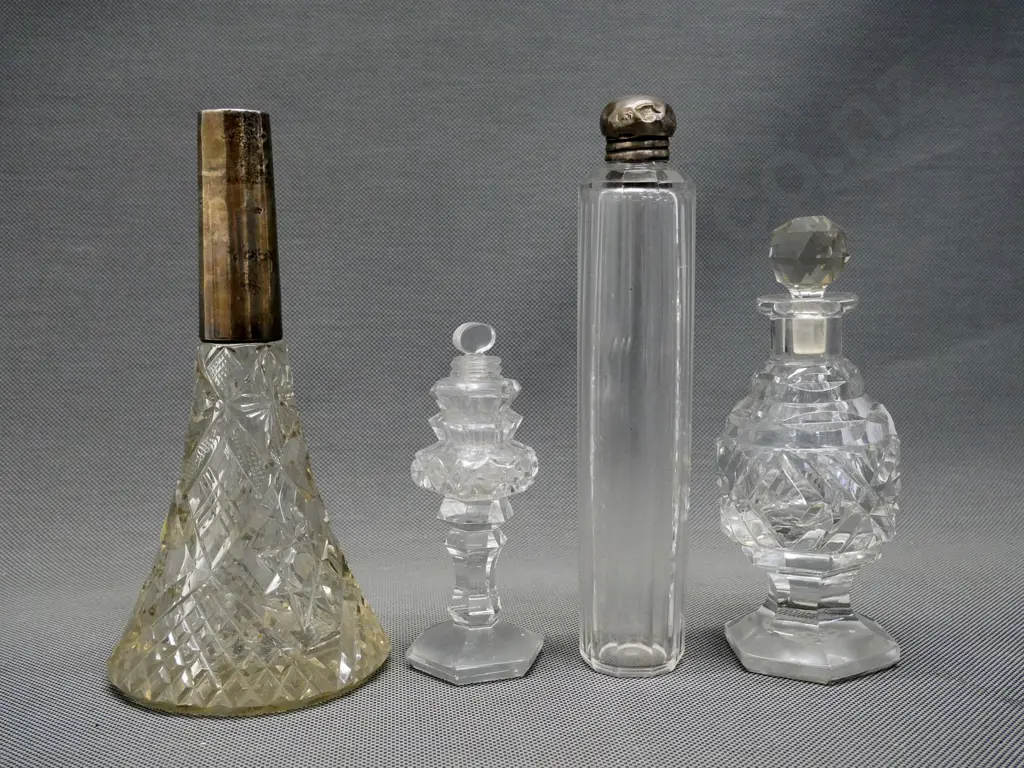 sterling mounted bottle, missing stopper, chip inside rim, sterling topped bottle H-180, and 2 stoppered scent bottles Image 1++