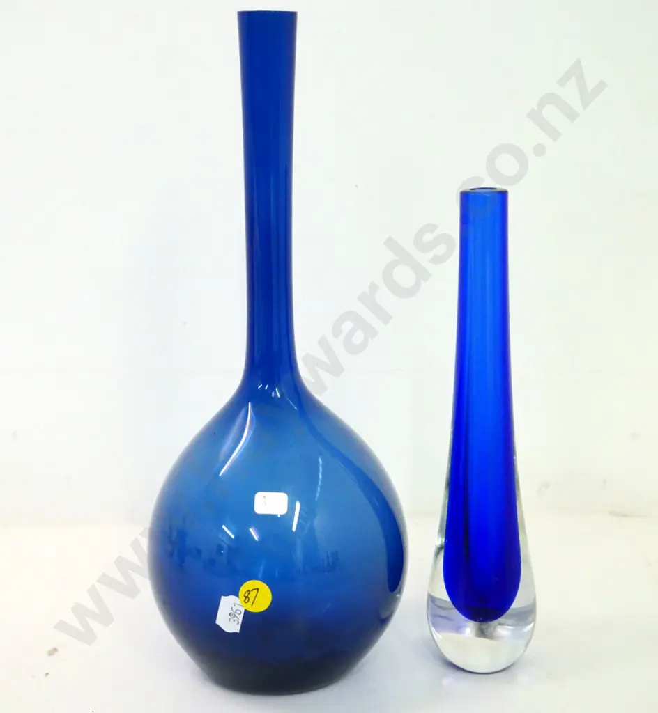 2 blue glass vases - shorter with heavy clear base, taller is H-310 Image 1++